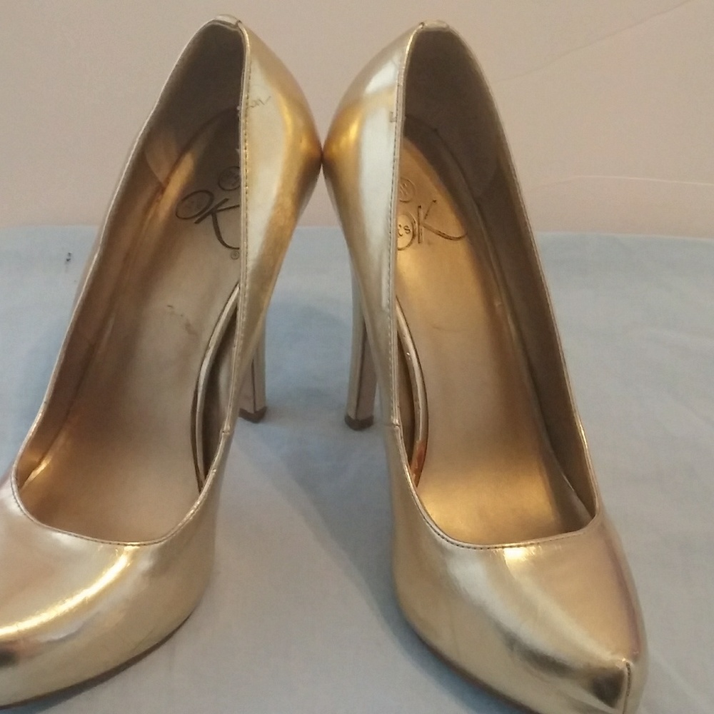 Gold high heels